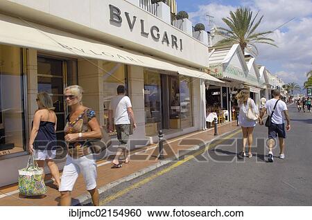 Stock Image - Luxury shops at the exclusive marina of Puerto Banús, Marbella, Costa del Sol, Málaga province, Andalusia, Spain, Europe. Fotosearch