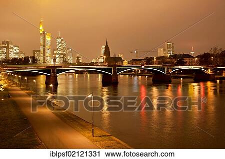 Main river with bank and the illuminated Frankfurt skyline at dusk, Frankfurt am Main, Hesse, Germany, Europe View Large Photo Image Stock Image - Main river with bank and the illuminated Frankfurt skyline at dusk, Frankfurt am Main, Hesse, Germany, Europe. Fotosearch