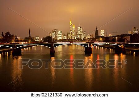 Main river with the illuminated Frankfurt skyline at dusk, Frankfurt am Main, Hesse, Germany, Europe View Large Photo Image Stock Image - Main river with the illuminated Frankfurt skyline at dusk, Frankfurt am Main, Hesse, Germany, Europe. Fotosearch