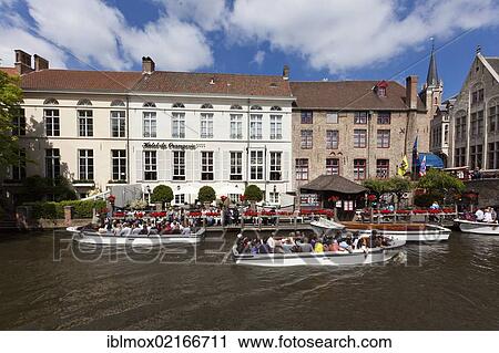 Many tourist boats near Onze-Lieve-Vrouwekerk, Church of Our Lady, historic centre of Bruges, UNESCO World Heritage Site, West Flanders, Flemish Region, Belgium, Europe View Large Photo Image Stock Image - Many tourist boats near Onze-Lieve-Vrouwekerk, Church of Our Lady, historic centre of Bruges, UNESCO World Heritage Site, West Flanders, Flemish Region, Belgium, Europe. Fotosearch