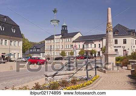 Stock Photography - Marketplace with Town Hall, the post mile pillar and a maypole, Zwoenitz, Saxony, Germany, Europe. Fotosearch