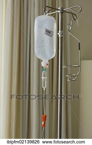 Medical intravenous infusion on a stand View Large Photo Image Stock Photograph - Medical intravenous infusion on a stand. Fotosearch