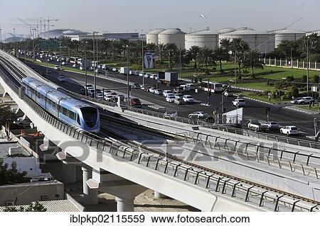 Metro train near the airport of Dubai, United Arab Emirates, Middle East, Asia View Large Photo Image Stock Photo - Metro train near the airport of Dubai, United Arab Emirates, Middle East, Asia. Fotosearch