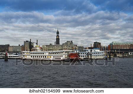 Mississippi Queen paddle wheeler, Port of Hamburg, St. Michaelis Church behind, Hamburg, Germany, Europe View Large Photo Image Stock Photo - Mississippi Queen paddle wheeler, Port of Hamburg, St. Michaelis Church behind, Hamburg, Germany, Europe. Fotosearch