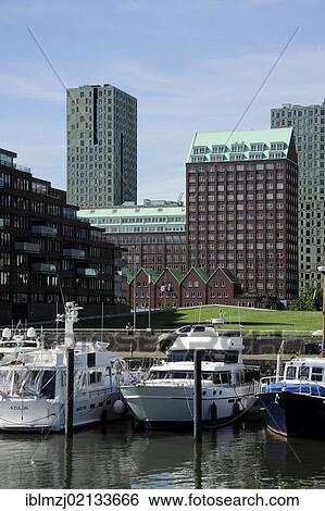 Modern architecture along the Nieuwe Maas River, boats in Entrepothaven Harbour, Kop van Zuid, Rotterdam, Holland, Nederland, Netherlands, Europe View Large Photo Image Stock Photograph - Modern architecture along the Nieuwe Maas River, boats in Entrepothaven Harbour, Kop van Zuid, Rotterdam, Holland, Nederland, Netherlands, Europe. Fotosearch
