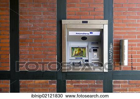 Modern cash dispenser built into a half-timbering wall, Copenhagen, Denmark, Europe View Large Photo Image Stock Image - Modern cash dispenser built into a half-timbering wall, Copenhagen, Denmark, Europe. Fotosearch