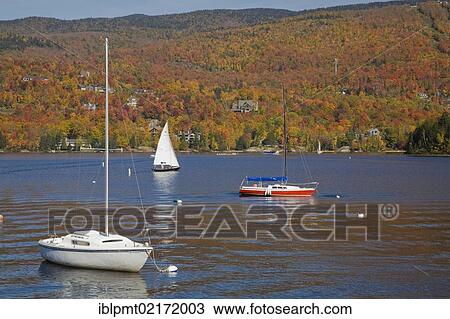 Stock Image - Mont-Tremblant lake in autumn, Laurentians, Quebec, Canada, North America. Fotosearch