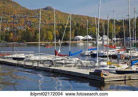Mont-Tremblant lake marina in autumn, Laurentians, Quebec, Canada, North America View Large Photo Image Picture - Mont-Tremblant lake marina in autumn, Laurentians, Quebec, Canada, North America. Fotosearch