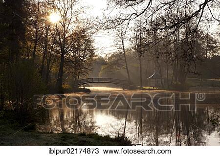 Morning fog over the castle pond, bridge, Schloss Pfaffroda Castle, Erzgebirge, Ore Mountains, Saxony, Germany, Europe View Large Photo Image Stock Image - Morning fog over the castle pond, bridge, Schloss Pfaffroda Castle, Erzgebirge, Ore Mountains, Saxony, Germany, Europe. Fotosearch