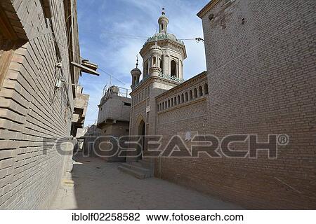 Stock Image - Mosque in an alleyway of the Uighur residential district, Uyghurs, Silk Road, Kashgar, Xinjiang, China, Asia. Fotosearch