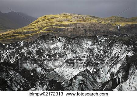 Moss-covered hill behind the Sólheimajoekull glacier tongue of the Mýrdalsjoekull Glacier near Skogar, Iceland, Europe View Large Photo Image Stock Image - Moss-covered hill behind the Sólheimajoekull glacier tongue of the Mýrdalsjoekull Glacier near Skogar, Iceland, Europe. Fotosearch