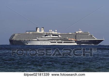 Motor yacht "Katara", 124. 4m, built in 2010 by Luerrsen Yachts, owned by the Emir of Qatar, im front of cruise liner "Noordam", Côte d'Azur, France, Mediterranean, Europe View Large Photo Image Stock Photo - Motor yacht "Katara", 124. 4m, built in 2010 by Luerrsen Yachts, owned by the Emir of Qatar, im front of cruise liner "Noordam", Côte d'Azur, France, Mediterranean, Europe. Fotosearch