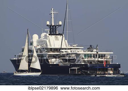 Motor yacht "Le Grand Bleu", 112. 80m, built in 2000 by Bremer Vulcan, architecture and exterior design by Kusch Yachts, Côte d'Azur, France, Mediterranean, Europe View Large Photo Image Stock Photograph - Motor yacht "Le Grand Bleu", 112. 80m, built in 2000 by Bremer Vulcan, architecture and exterior design by Kusch Yachts, Côte d'Azur, France, Mediterranean, Europe. Fotosearch