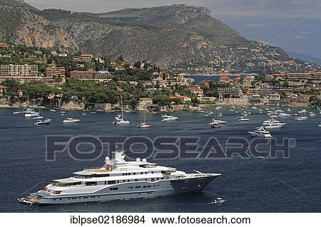 Motor yacht, Radiant, built by Luerssen Yachts, overall length, 110 metres, built in 2009, owned by the Al Futtaim family, United Arab Emirates, in the Bay of Villefranche, Côte d'Azur, France, Mediterranean, Europe, Asia View Large Photo Image Picture - Motor yacht, Radiant, built by Luerssen Yachts, overall length, 110 metres, built in 2009, owned by the Al Futtaim family, United Arab Emirates, in the Bay of Villefranche, Côte d'Azur, France, Mediterranean, Europe, Asia. Fotosearch