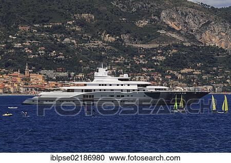 Motor yacht, Radiant, built by Luerssen Yachts, overall length, 110 metres, built in 2009, owned by the Al Futtaim family, United Arab Emirates, at Cap Martin, with Menton at the rear, Côte d'Azur, France, Mediterranean, Europe, Asia View Large Photo Image Stock Image - Motor yacht, Radiant, built by Luerssen Yachts, overall length, 110 metres, built in 2009, owned by the Al Futtaim family, United Arab Emirates, at Cap Martin, with Menton at the rear, Côte d'Azur, France, Mediterranean, Europe, Asia. Fotosearch