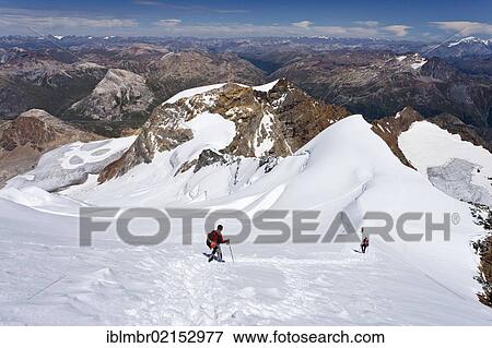 Mountain climbers descending Piz Palue Mountain, Grisons, Switzerland, Europe View Large Photo Image Stock Photo - Mountain climbers descending Piz Palue Mountain, Grisons, Switzerland, Europe. Fotosearch