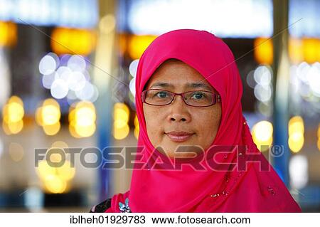 Muslim woman, portrait, National Mosque, Kuala Lumpur, Malaysia, Southeast Asia, Asia View Large Photo Image Stock Image - Muslim woman, portrait, National Mosque, Kuala Lumpur, Malaysia, Southeast Asia, Asia. Fotosearch