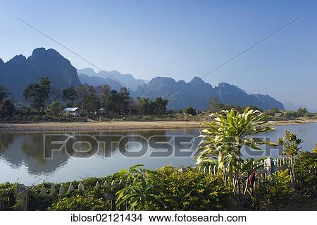 Nam Song River, karst mountains, Vang Vieng, Vientiane, Laos, Indochina, Asia View Large Photo Image Picture - Nam Song River, karst mountains, Vang Vieng, Vientiane, Laos, Indochina, Asia. Fotosearch