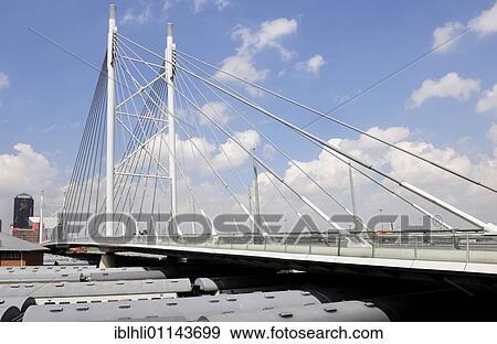 Stock Photo - Nelson Mandela Bridge at Park Station in Johannesburg, South Africa, Africa. Fotosearch