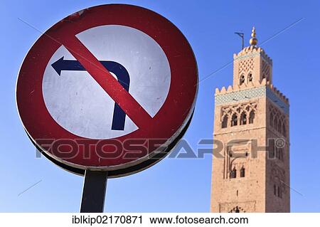 Stock Image - No left turn road sign with a mosque behind, Marrakesh, Morocco, Africa. Fotosearch
