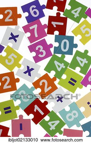 Stock Image - Numbers puzzle with math symbols. Fotosearch