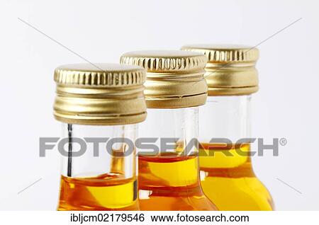 Stock Photograph - Oil bottles. Fotosearch
