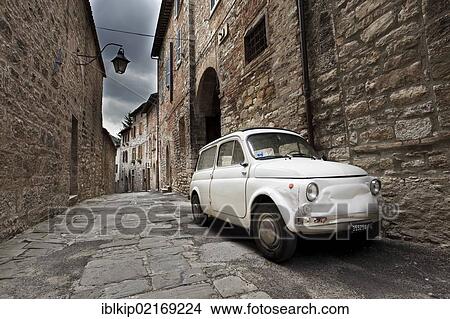 Old classic Fiat 500 on a street in Gubbio, Umbria, Italy, Europe View Large Photo Image Picture - Old classic Fiat 500 on a street in Gubbio, Umbria, Italy, Europe. Fotosearch