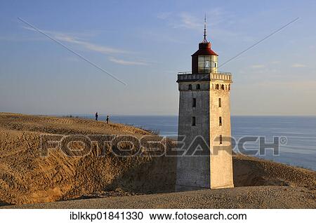 Old lighthouse on Rubjerg Knude, a wandering dune in Denmark, Europe View Large Photo Image Stock Image - Old lighthouse on Rubjerg Knude, a wandering dune in Denmark, Europe. Fotosearch