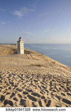 Old lighthouse on Rubjerg Knude, a wandering dune in Denmark, Europe View Large Photo Image Stock Photo - Old lighthouse on Rubjerg Knude, a wandering dune in Denmark, Europe. Fotosearch