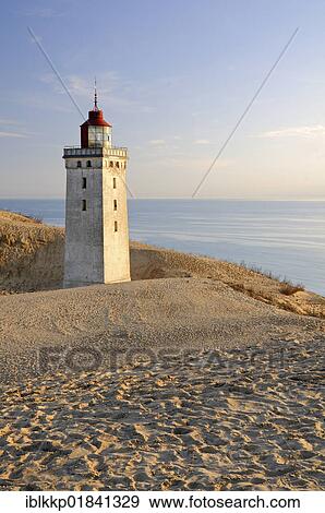 Old lighthouse on Rubjerg Knude, a wandering dune in Denmark, Europe View Large Photo Image Stock Photo - Old lighthouse on Rubjerg Knude, a wandering dune in Denmark, Europe. Fotosearch