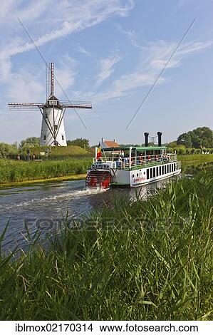Old paddle wheel steamer on the canal between Bruges and Damme, Damse Vaart-Zuid, Damme, Bruges, West Flanders, Flemish Region, Belgium, Europe View Large Photo Image Picture - Old paddle wheel steamer on the canal between Bruges and Damme, Damse Vaart-Zuid, Damme, Bruges, West Flanders, Flemish Region, Belgium, Europe. Fotosearch