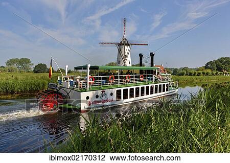 Old paddle wheel steamer on the canal between Bruges and Damme, Damse Vaart-Zuid, Damme, Bruges, West Flanders, Flemish Region, Belgium, Europe View Large Photo Image Stock Image - Old paddle wheel steamer on the canal between Bruges and Damme, Damse Vaart-Zuid, Damme, Bruges, West Flanders, Flemish Region, Belgium, Europe. Fotosearch