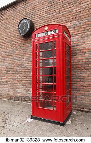Stock Photo - Old telephone box, Bushmills Distillery, Bushmills, County Antrim, Northern Ireland, Great Britain, Europe. Fotosearch