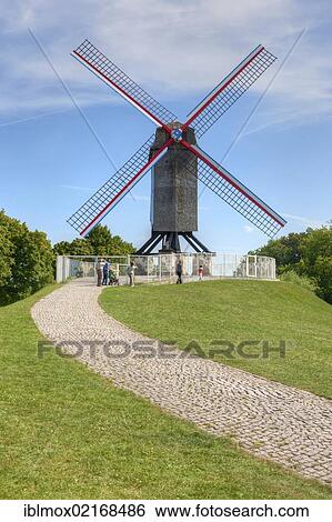 Old windmill at the Vlaanderen Fietsroute, Flanders Bike Trail, at the Coupure Canal, Bruges, West Flanders, Flemish Region, Belgium, Europe View Large Photo Image Stock Photograph - Old windmill at the Vlaanderen Fietsroute, Flanders Bike Trail, at the Coupure Canal, Bruges, West Flanders, Flemish Region, Belgium, Europe. Fotosearch