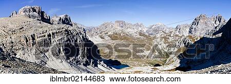 Stock Image - On Buellelejoch Pass, looking towards Paternkofel Pass, the Three Peaks Hut and Dreischusterspitze Mountain, with the Altensteintal Valley below, Sesto, Alta Pusteria, Dolomites, Alto Adige, Italy, Europe. Fotosearch