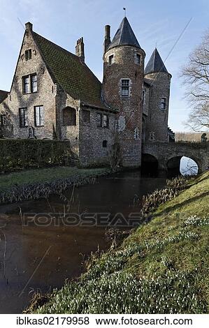 Stock Photo - Ooostkerke Castle from the 14th century, polder village of Ooostkerke-Damme, West Flanders, Belgium, Europe. Fotosearch