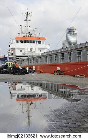 Orange ship at Parkhaven harbour, Nieuwe Maas River, Rotterdam, Holland, Nederland, the Netherlands, Europe View Large Photo Image Stock Image - Orange ship at Parkhaven harbour, Nieuwe Maas River, Rotterdam, Holland, Nederland, the Netherlands, Europe. Fotosearch