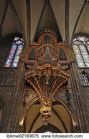 Stock Photography - Organ in the nave with its preserved Gothic casing, nave, interior view of Strasbourg Cathedral, Cathedral of Our Lady of Strasbourg, Strasbourg, Bas-Rhin département, Alsace, France, Europe. Fotosearch