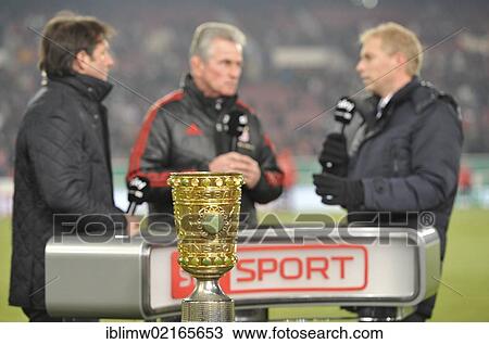 Original DFB trophy in front of Jupp Heynckes, coach of FC Bayern Muenchen, Bruno Labbadia, coach of VfB Stuttgart, and far left, a Sky Sports presenter, Mercedes-Benz Arena, Stuttgart, Baden-Wuerttemberg, Germany, Europe View Large Photo Image Stock Image - Original DFB trophy in front of Jupp Heynckes, coach of FC Bayern Muenchen, Bruno Labbadia, coach of VfB Stuttgart, and far left, a Sky Sports presenter, Mercedes-Benz Arena, Stuttgart, Baden-Wuerttemberg, Germany, Europe. Fotosearch