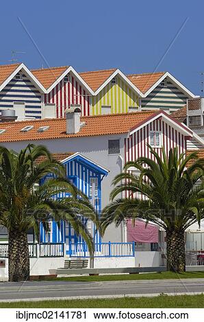 Stock Image - Palheiros, colourful houses, Costa Nova, Aveiro, Beiras region, Portugal, Europe. Fotosearch