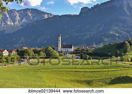 Parish Church of St. Nicholas, with Aggenstein Mountain at the rear, Pfronten, Upper Bavaria, Bavaria, Germany, Europe, PublicGround, Europe View Large Photo Image Picture - Parish Church of St. Nicholas, with Aggenstein Mountain at the rear, Pfronten, Upper Bavaria, Bavaria, Germany, Europe, PublicGround, Europe. Fotosearch