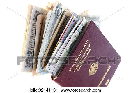 Passport stuffed with banknotes, different currencies from around the world, foreign exchange View Large Photo Image Stock Image - Passport stuffed with banknotes, different currencies from around the world, foreign exchange. Fotosearch