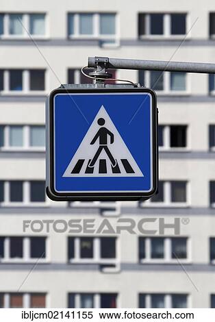 Pedestrian crossing sign in front of apartment buildings View Large Photo Image Stock Photography - Pedestrian crossing sign in front of apartment buildings. Fotosearch