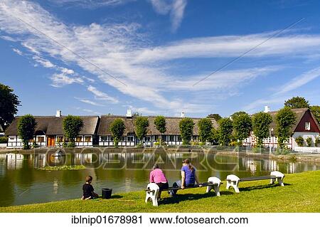 People enjoying the area around the village pond, Nordby, Samsoe, Denmark, Europe View Large Photo Image Stock Image - People enjoying the area around the village pond, Nordby, Samsoe, Denmark, Europe. Fotosearch