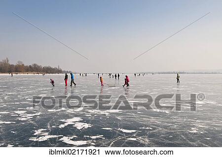 People walking on the ice of a frozen Lake Constance, Markelfinger Winkel, Radolfzell, Konstanz district, Baden-Wuerttemberg, Germany, Europe View Large Photo Image Stock Image - People walking on the ice of a frozen Lake Constance, Markelfinger Winkel, Radolfzell, Konstanz district, Baden-Wuerttemberg, Germany, Europe. Fotosearch