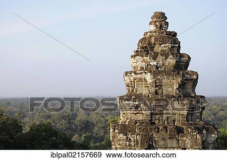 Stock Photo - Phnom Bakheng pyramid temple, rainforest, Angkor, Siem Reap, Cambodia, Southeast Asia, Asia. Fotosearch