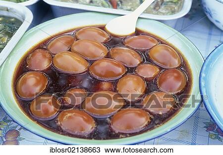 Stock Image - Pickled eggs, Talat Tha Heua Market, Luang Prabang, Laos, Indochina, Asia. Fotosearch