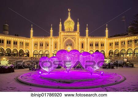 Pink Christmas hearts in front of restaurant Nimb in Tivoli, Copenhagen, Denmark, Europe View Large Photo Image Stock Image - Pink Christmas hearts in front of restaurant Nimb in Tivoli, Copenhagen, Denmark, Europe. Fotosearch