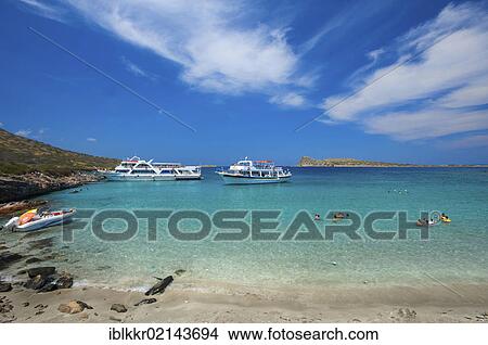 Pleasure boats off Kolokithia beach on Spinalonga, near Elounda, Crete, Greece, Europe View Large Photo Image Picture - Pleasure boats off Kolokithia beach on Spinalonga, near Elounda, Crete, Greece, Europe. Fotosearch