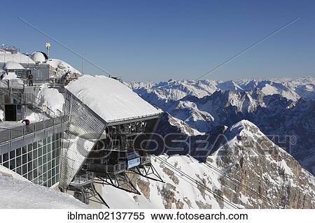 Pod of the Gletscherbahn cable car railway and summit cross, Zugspitze Mountain, Wetterstein Mountains, Upper Bavaria, Bavaria, Germany, Europe View Large Photo Image Stock Photography - Pod of the Gletscherbahn cable car railway and summit cross, Zugspitze Mountain, Wetterstein Mountains, Upper Bavaria, Bavaria, Germany, Europe. Fotosearch